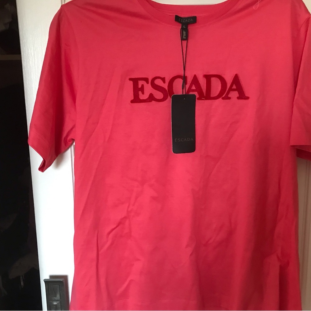 Short sleeve red top short by Escada in XL size, new with original tag attached.